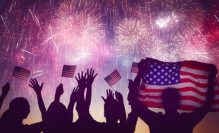 People holding the flag of the USA